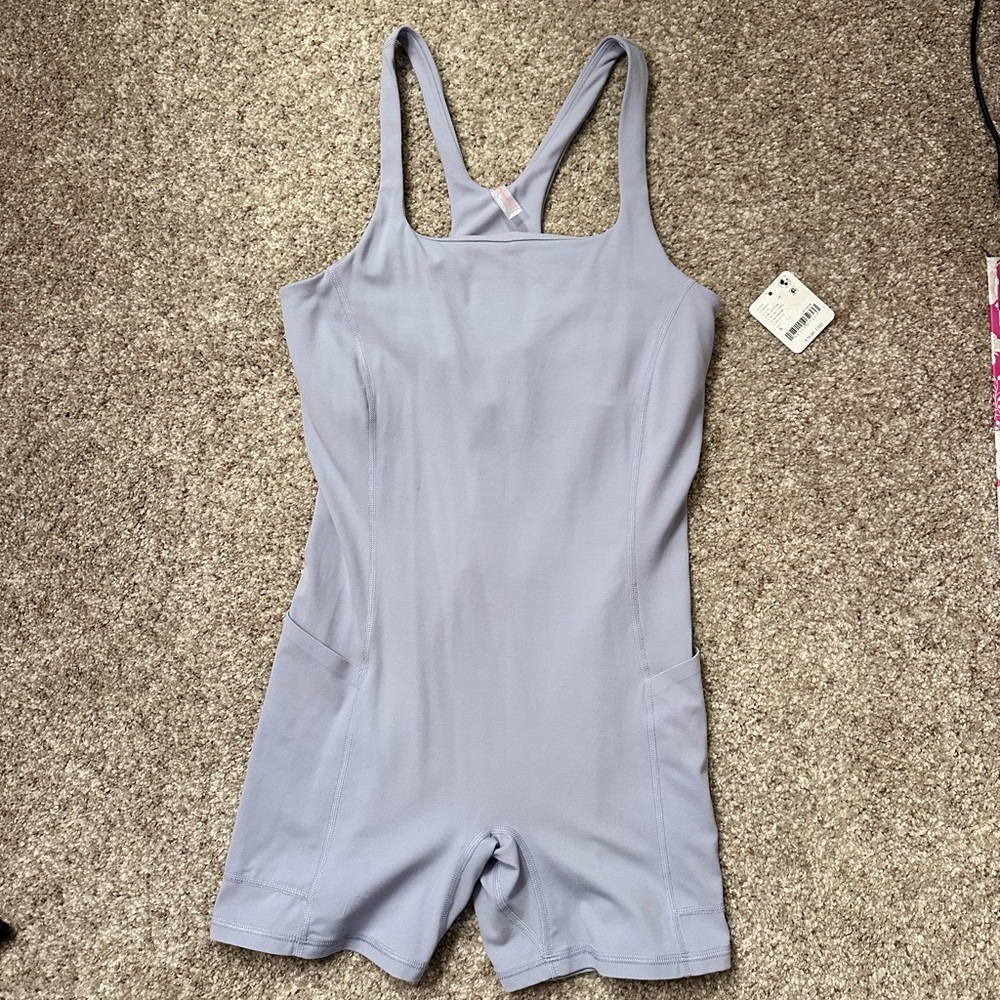 Free People Blue Jumpsuit with Racerback Design